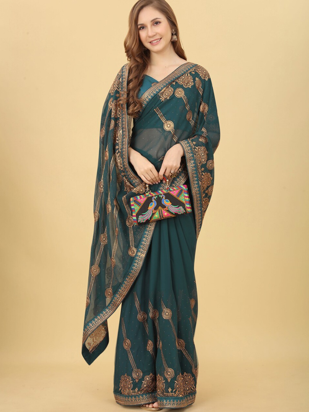

VILLAGIUS Ethnic Motifs Embroidered Pure Georgette Saree, Turquoise blue