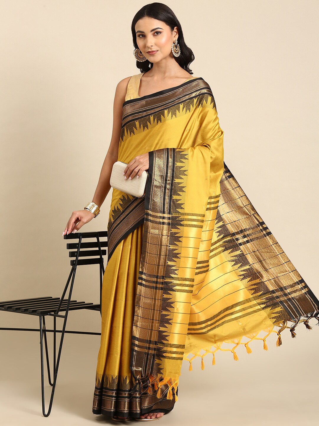 

Anouk Ethnic Motif Woven Design Silk Blend Kanjeevaram Zari Saree, Mustard