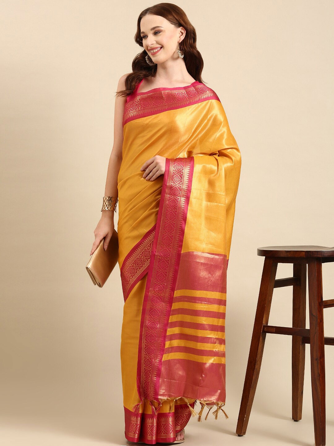 

Anouk Mustard Yellow & Pink Woven Design Zari Kanjeevaram Saree