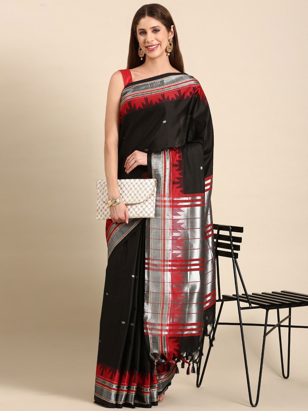 

Anouk Black & Red Floral Woven Design Zari Kanjeevaram Saree