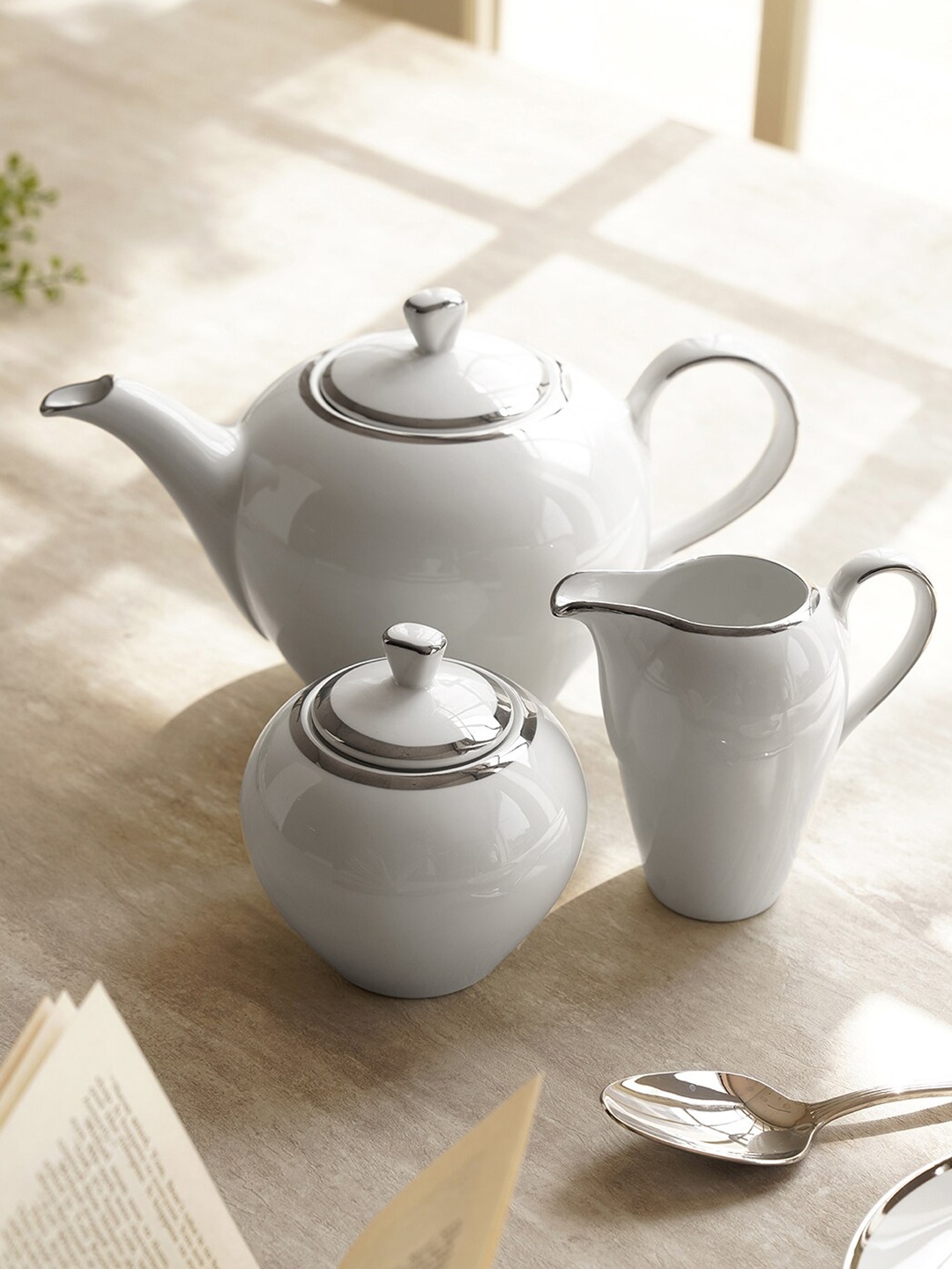

Pure Home and Living White & Silver Toned 3 Pieces Porcelain Glossy Kettle Set