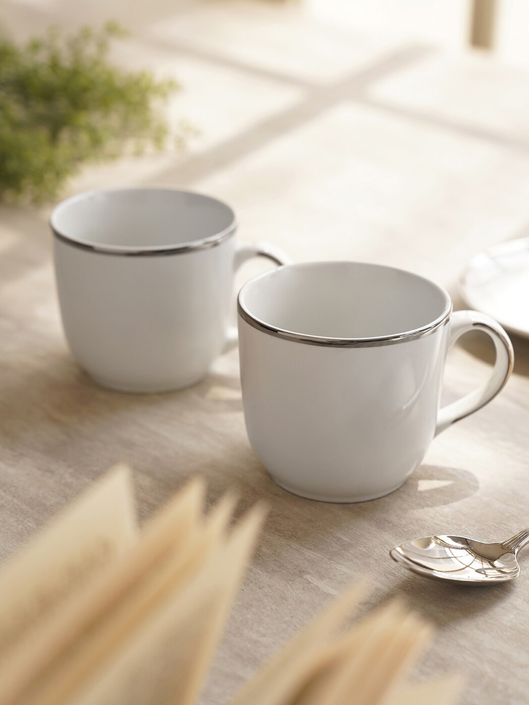 

Pure Home and Living White & Silver Toned 2 Pieces Porcelain Glossy Mugs - 330 ml each