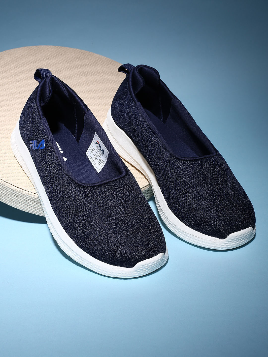 

FILA Women GARIYO Memory Foam Insole Contrast Sole Slip-On Sneakers, Navy blue