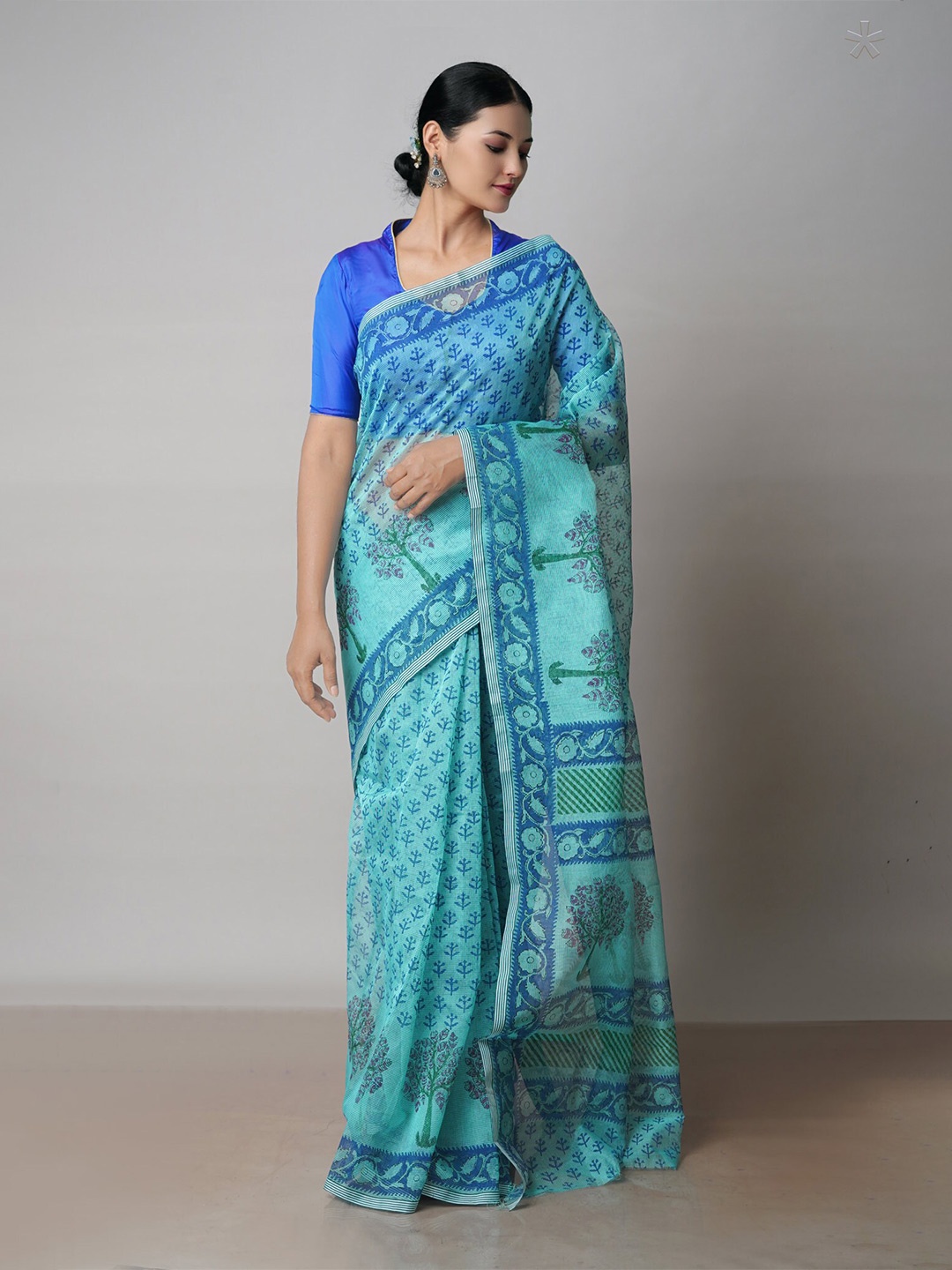 

Unnati Silks Ethnic Motifs Block Printed Supernet Dabu Saree, Blue