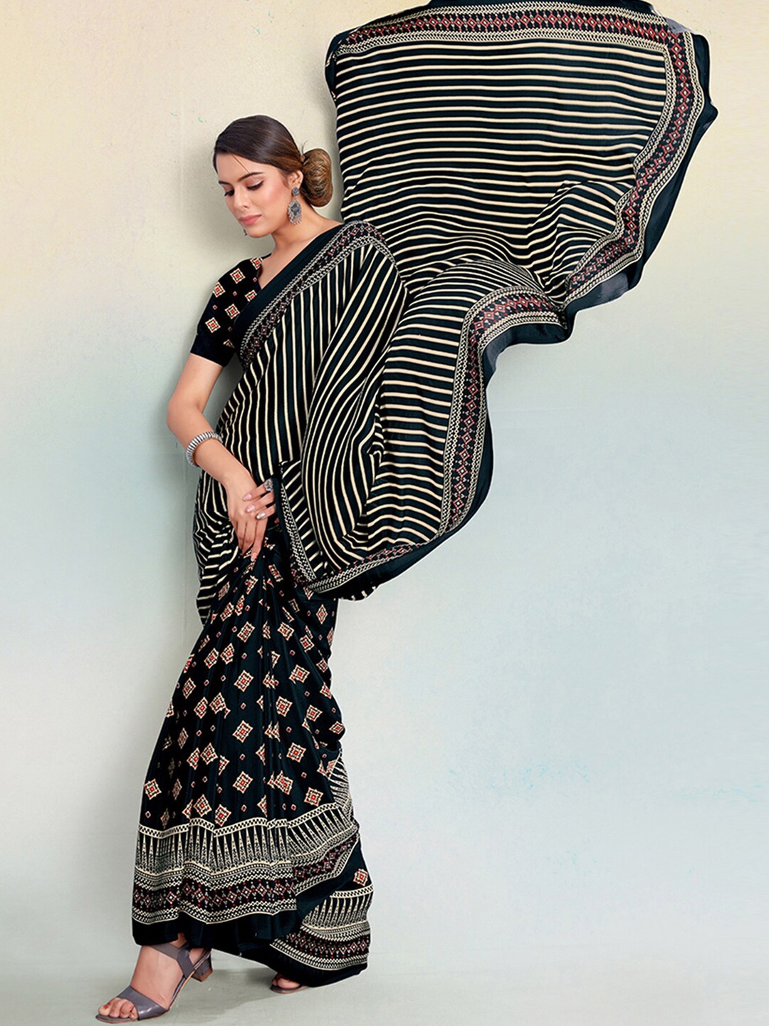 

Satrani Black & Yellow Ethnic Motifs Printed Saree