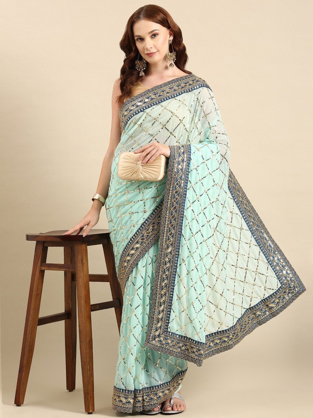 

Anouk Sea Green & Gold-Toned Sequin Embellished Saree