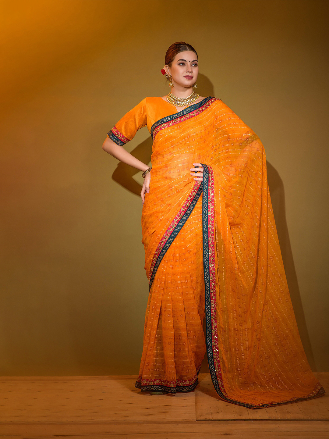 

elora Floral Printed Sequinned Pure Georgette Bhagalpuri Saree, Yellow