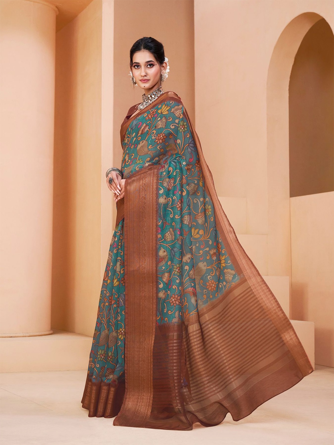 

Sangria Teal & Brown Floral Zari Cotton Blend Saree With Blouse Piece