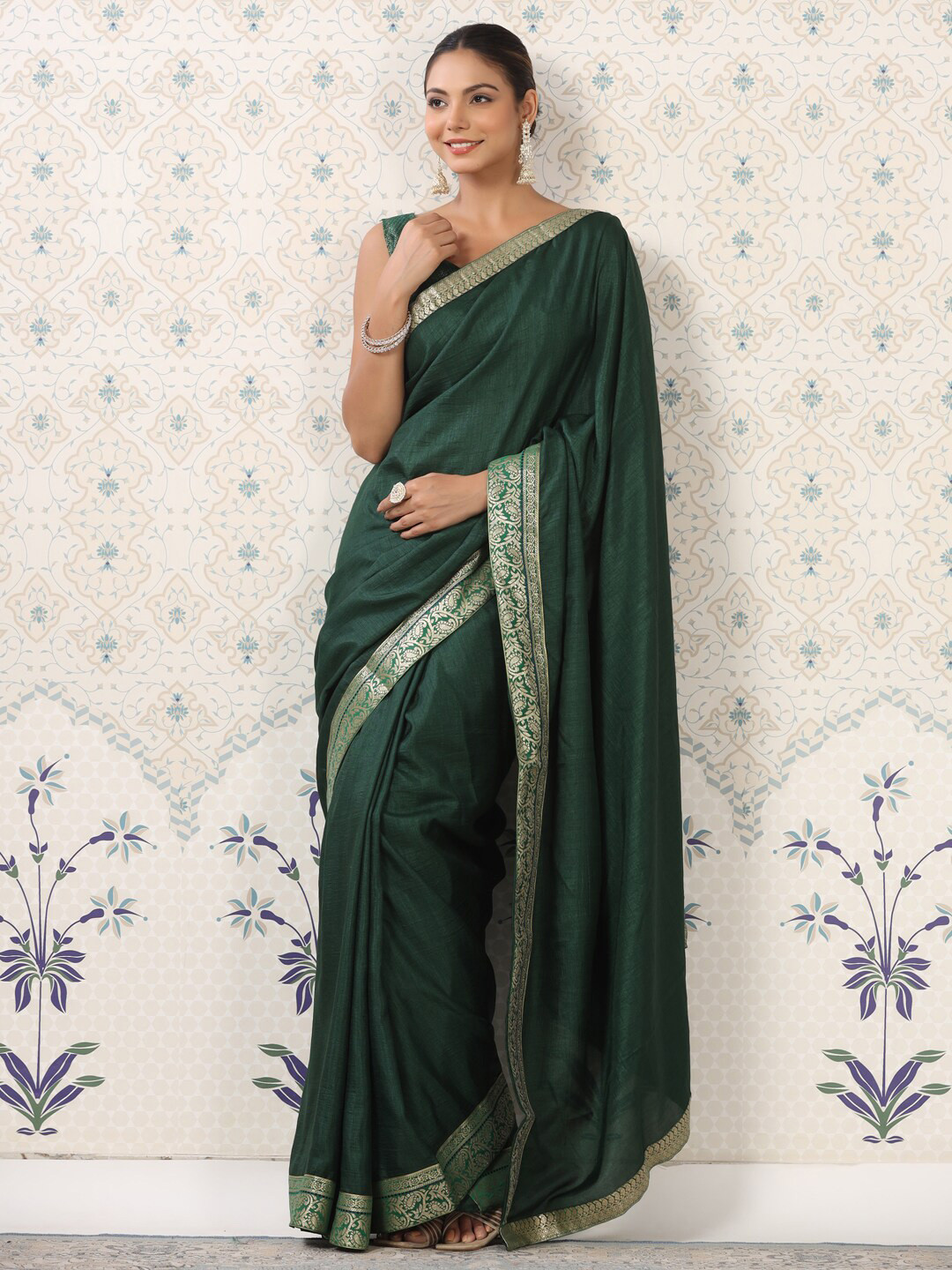 

Ode by House of Pataudi Green & Gold-Toned Zari Poly Silk Saree