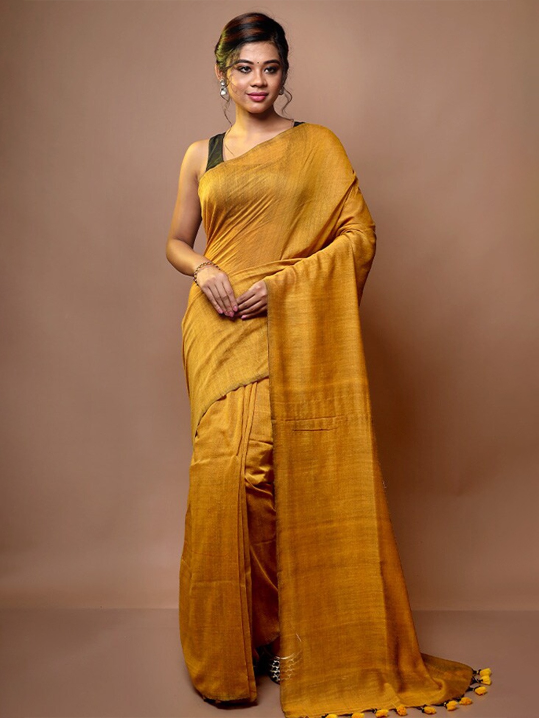 

AllSilks Mustard Yellow Tasselled Cotton Blend Saree