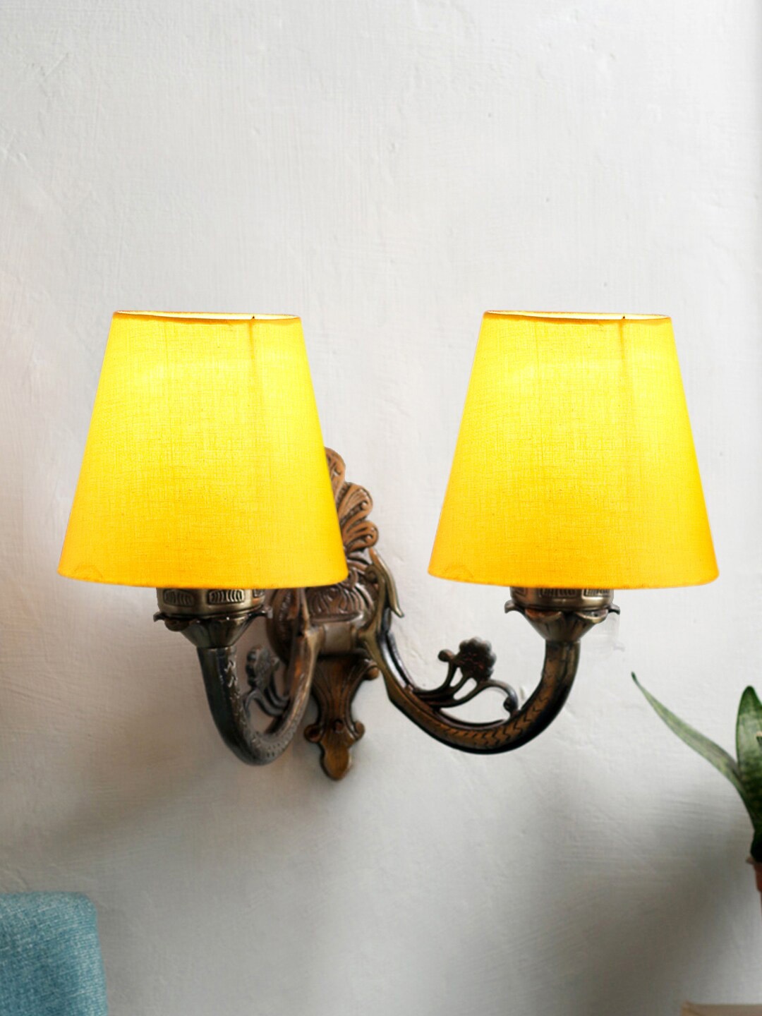 

Devansh Yellow & Gold Toned Antique Wall Lamp With Cotton Shade