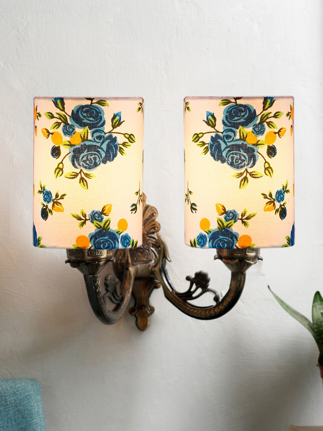 

Devansh White & Blue Printed Antique Wall Lamp With Cotton Shade