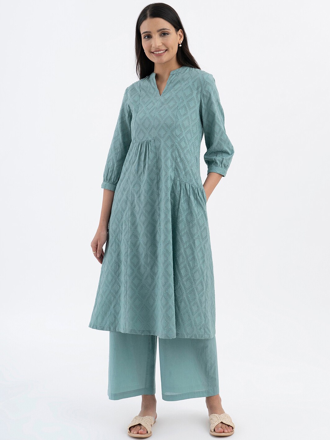 

Pink Fort Women Green Regular Pure Cotton Kurta with Palazzos