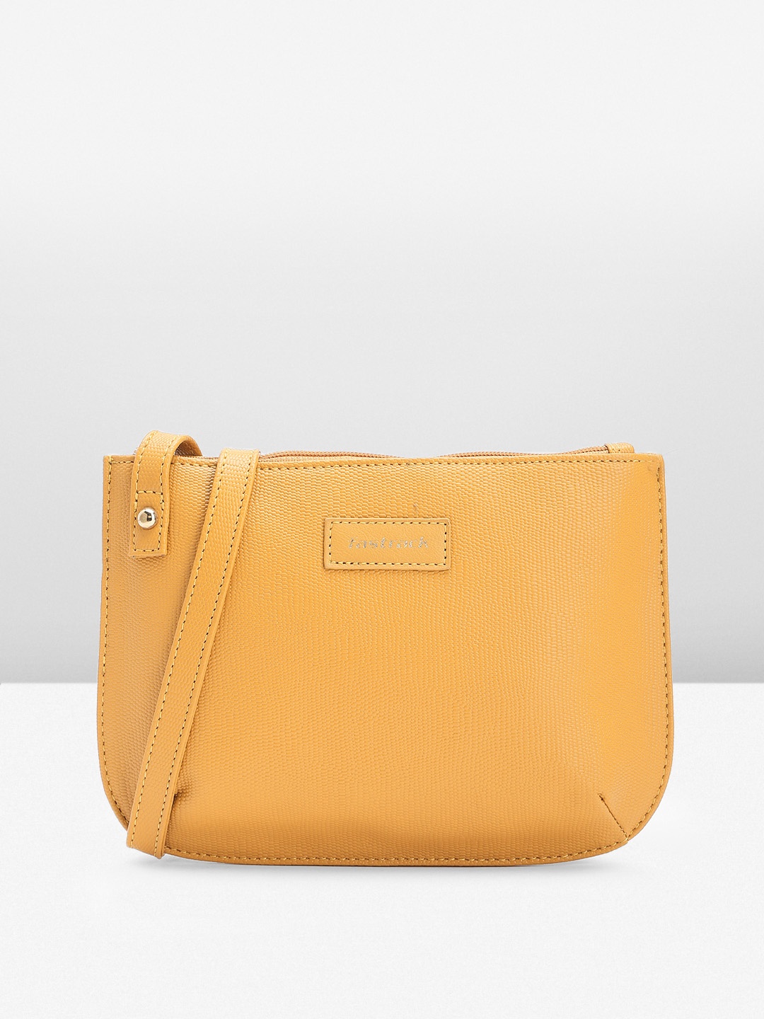 

Fastrack Textured Sling Bag, Mustard