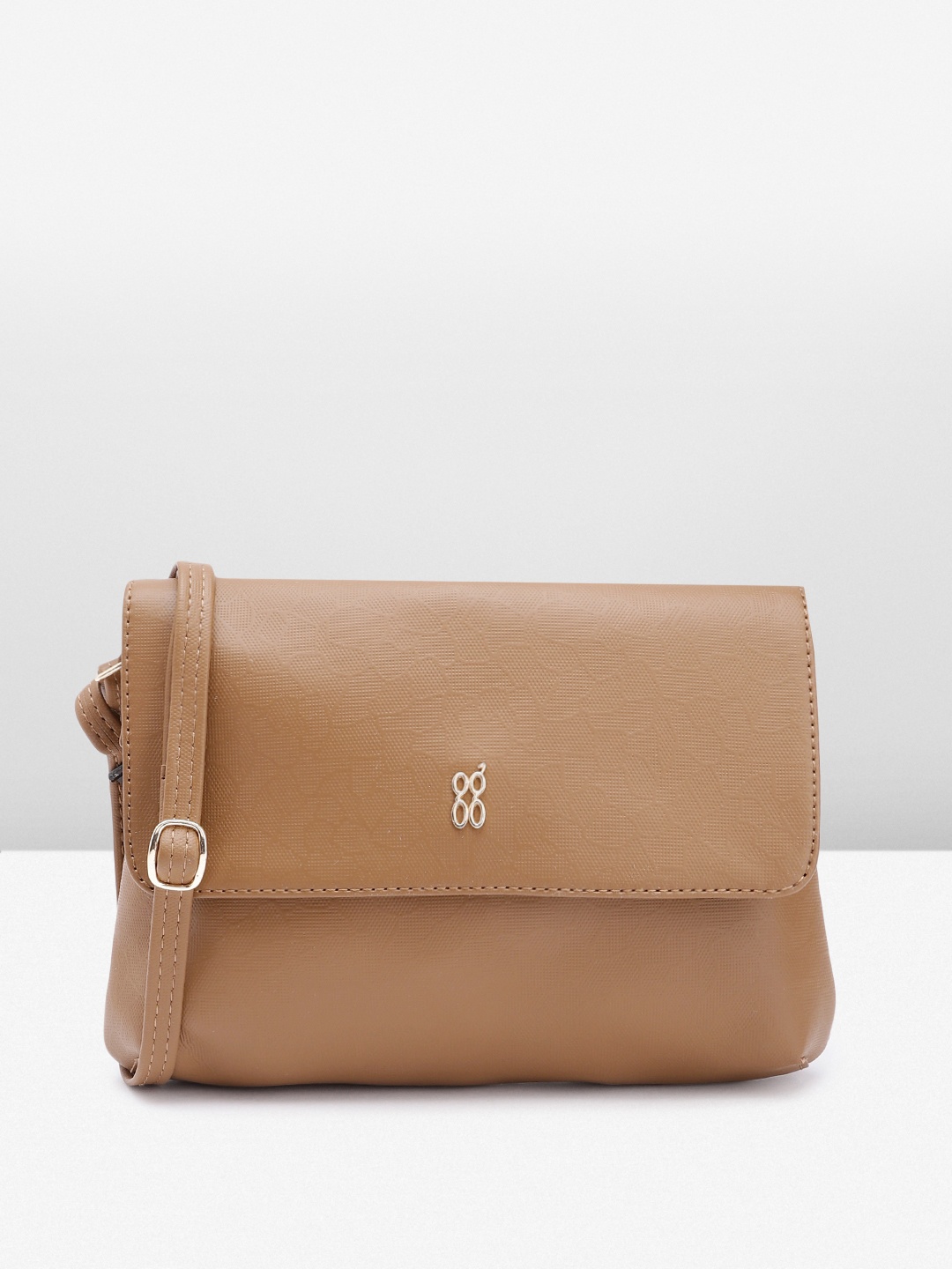 

Baggit Women Solid Sling Bag, Brown