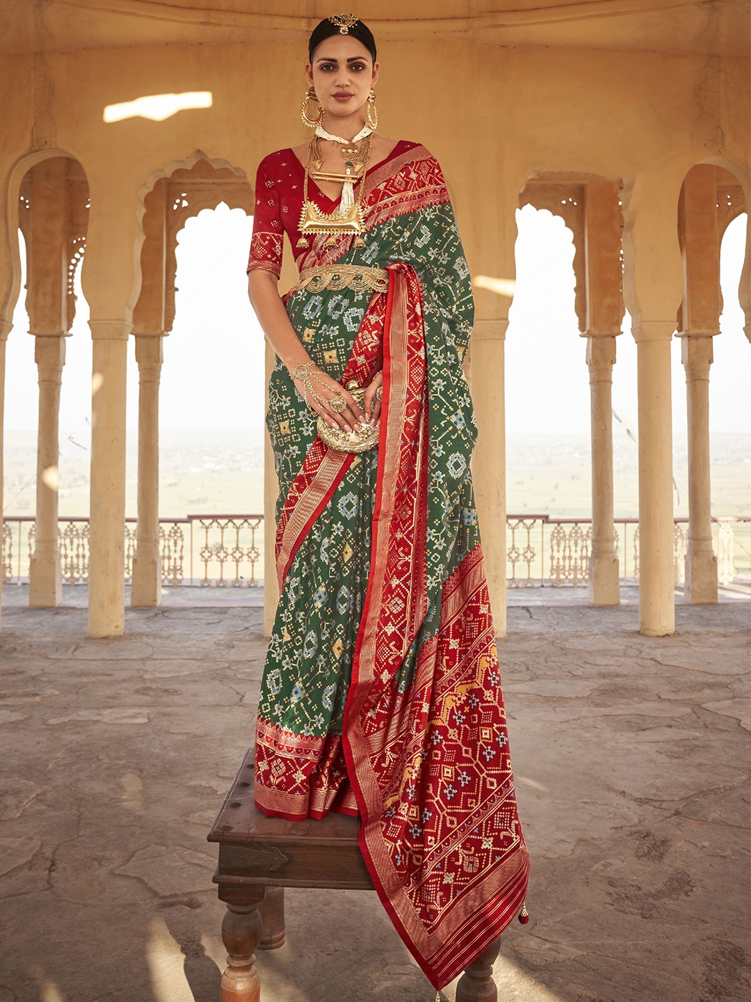 

Phenav Ethnic Motifs Printed Zari Saree, Red