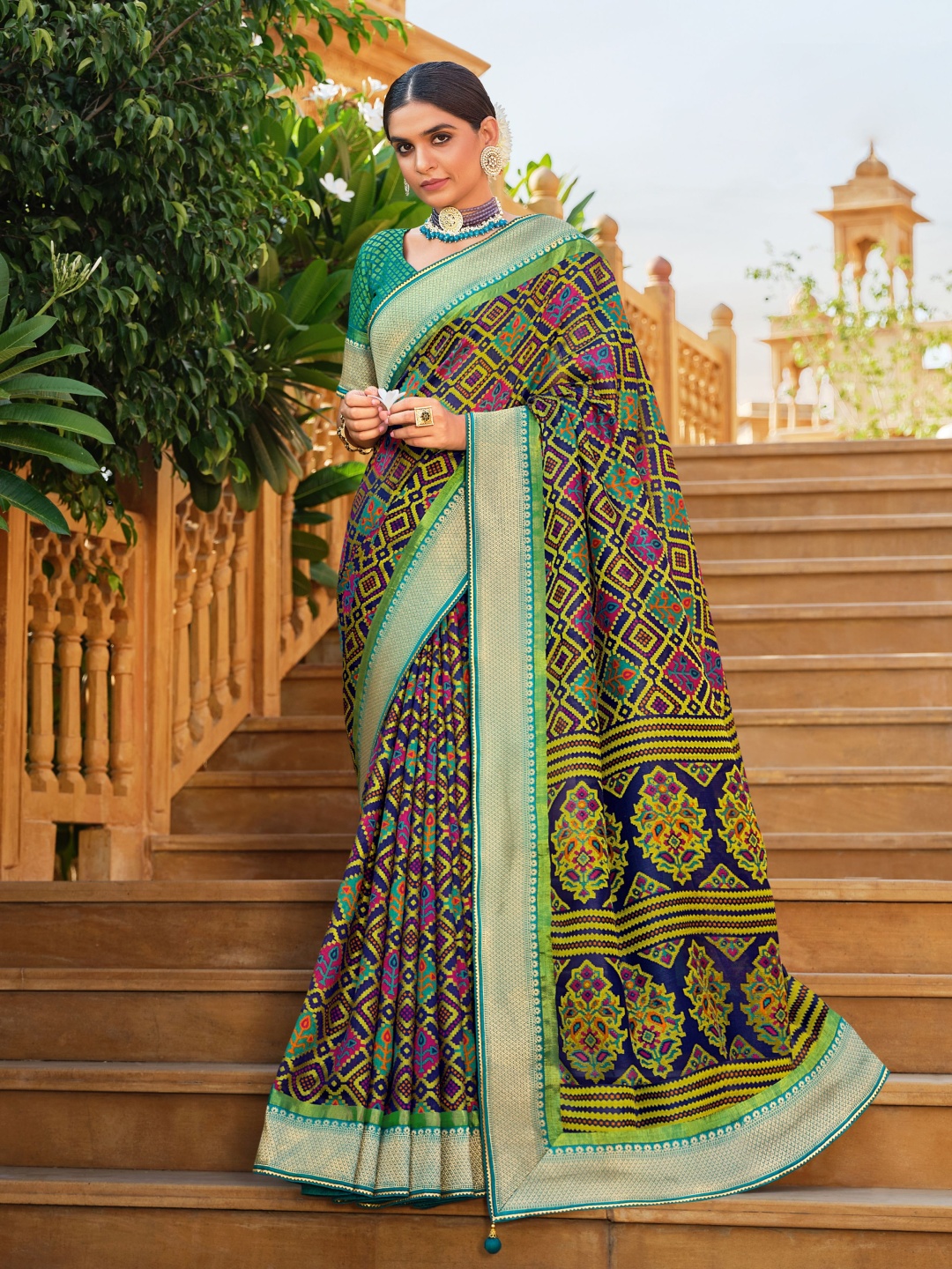 

Phenav Ethnic Motifs Zari Border Ikat Silk Saree with Blouse, Blue