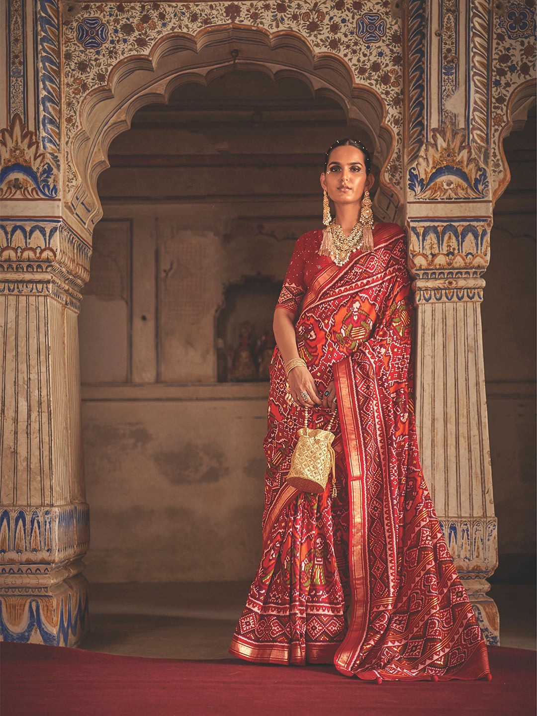 

Phenav Ethnic Motifs Printed Zari Border Ikat Silk Saree with Blouse, Red