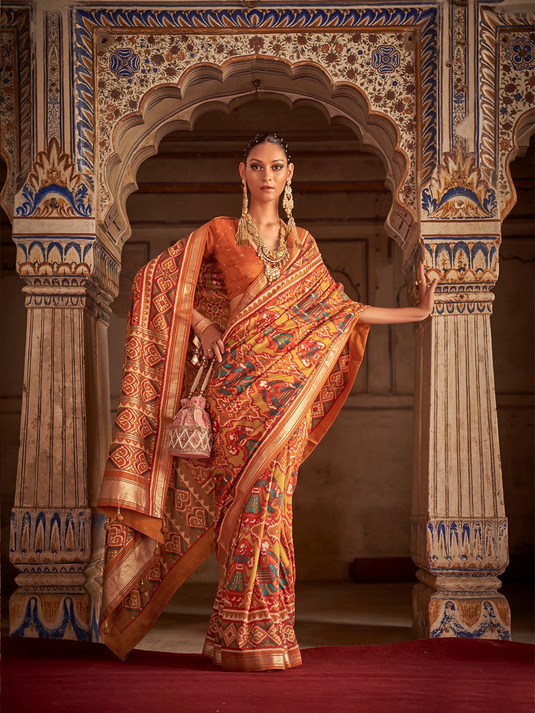 

Phenav Ethnic Motifs Zari Border Ikat Silk Saree with Blouse, Red