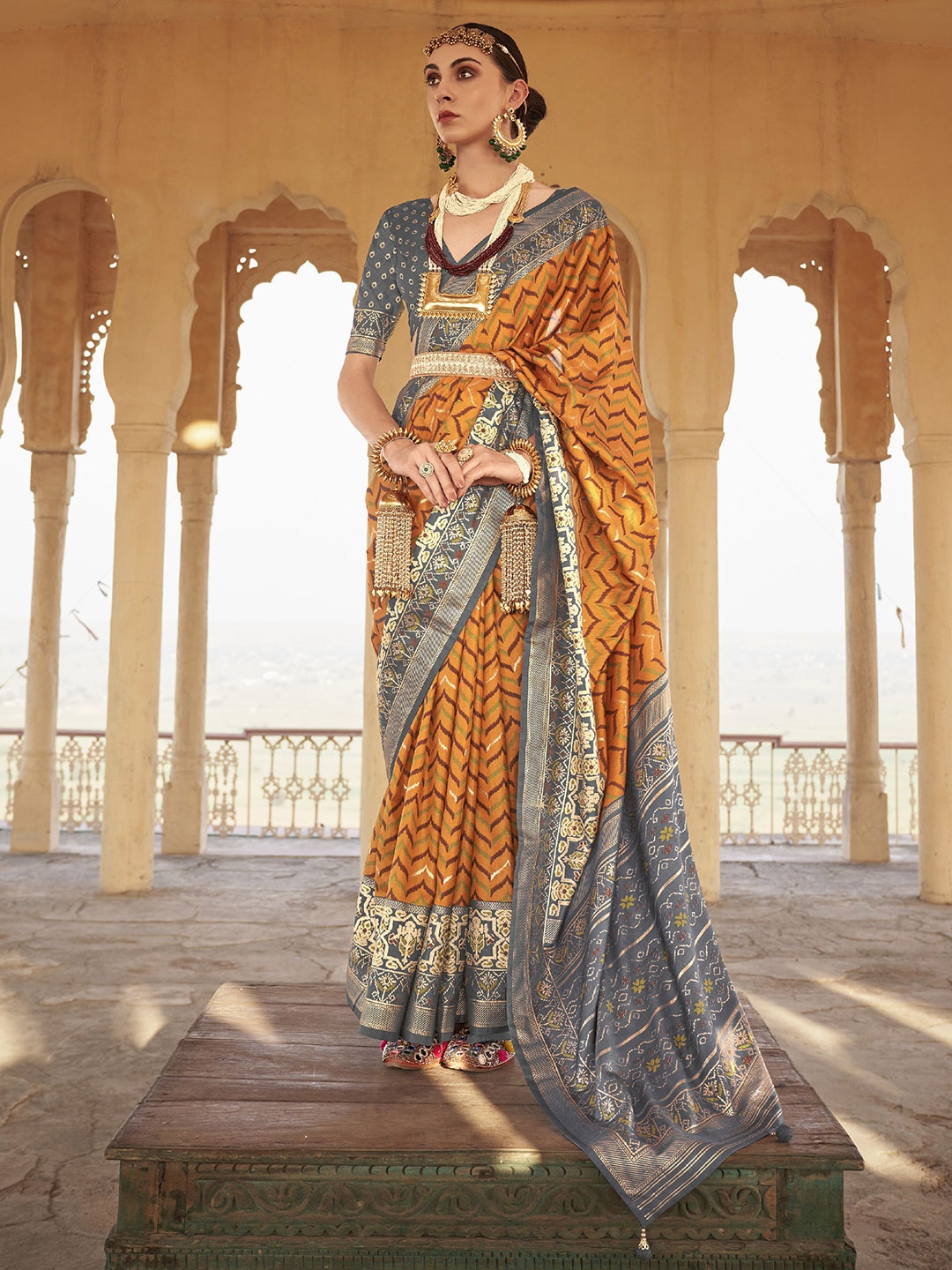 

Phenav Ethnic Motifs Printed Zari Saree, Mustard