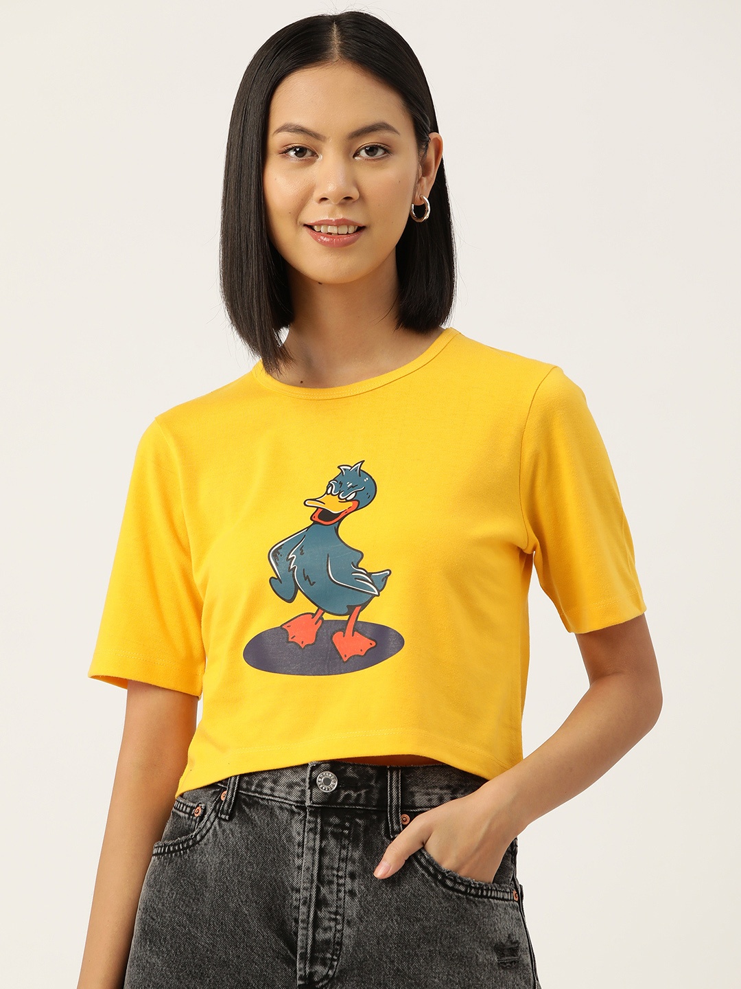 

Slenor Women Graphic Printed Pure Cotton Crop T-shirt, Yellow