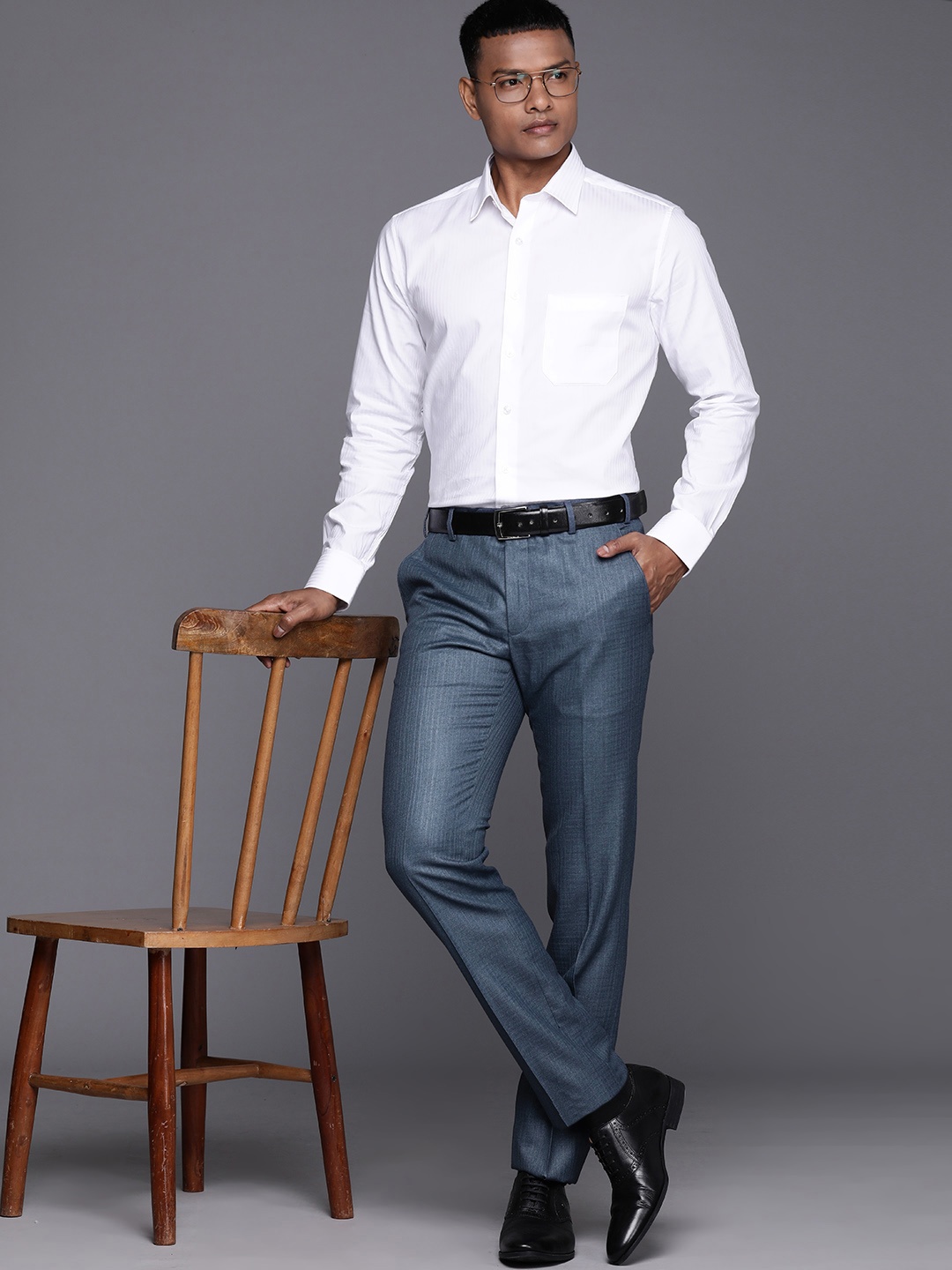 

Raymond Men Textured Slim Fit Trousers, Blue