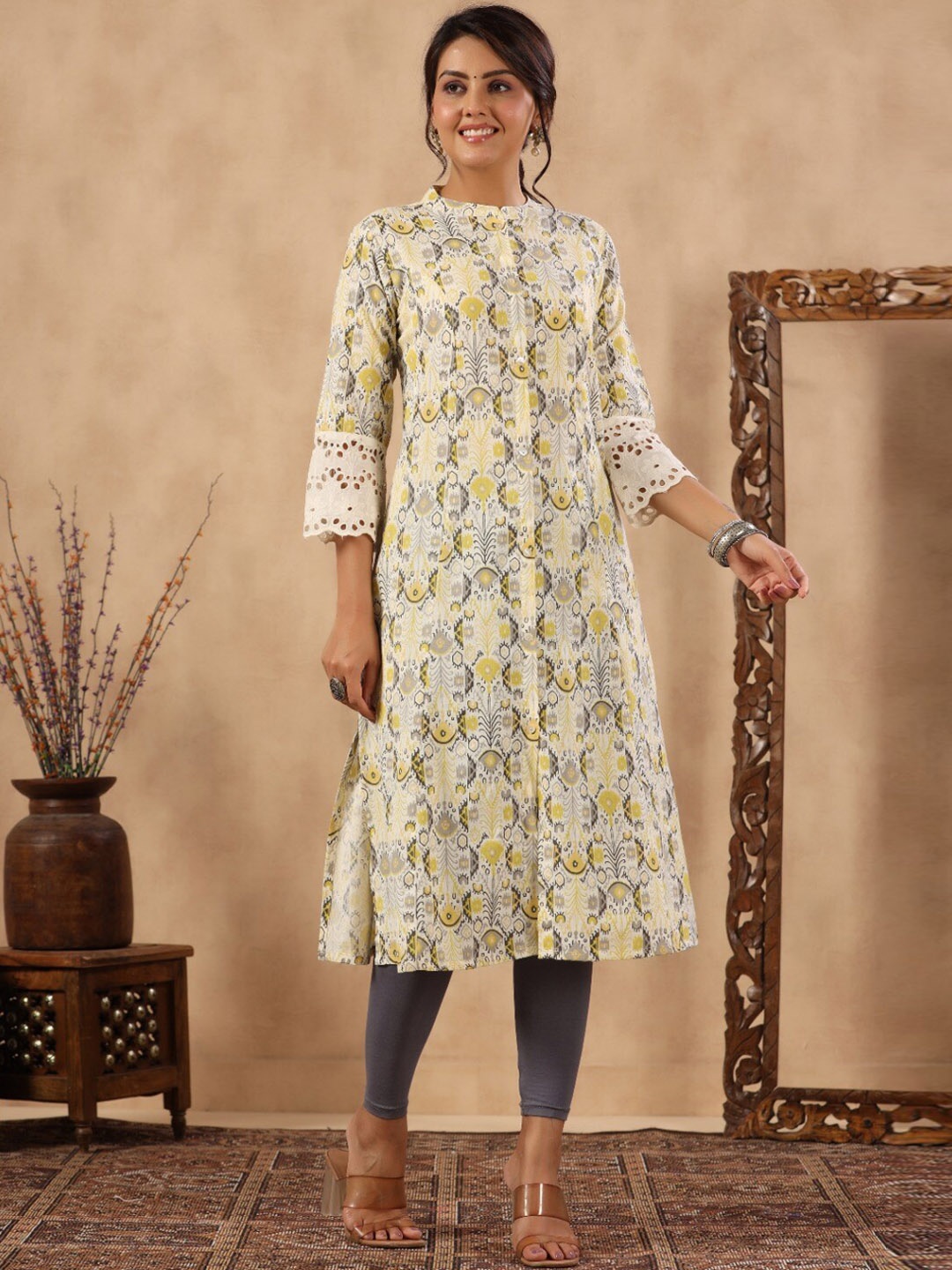 

Meena Bazaar Abstract Printed Band Collar Panelled A-Line Cotton Kurta, Cream