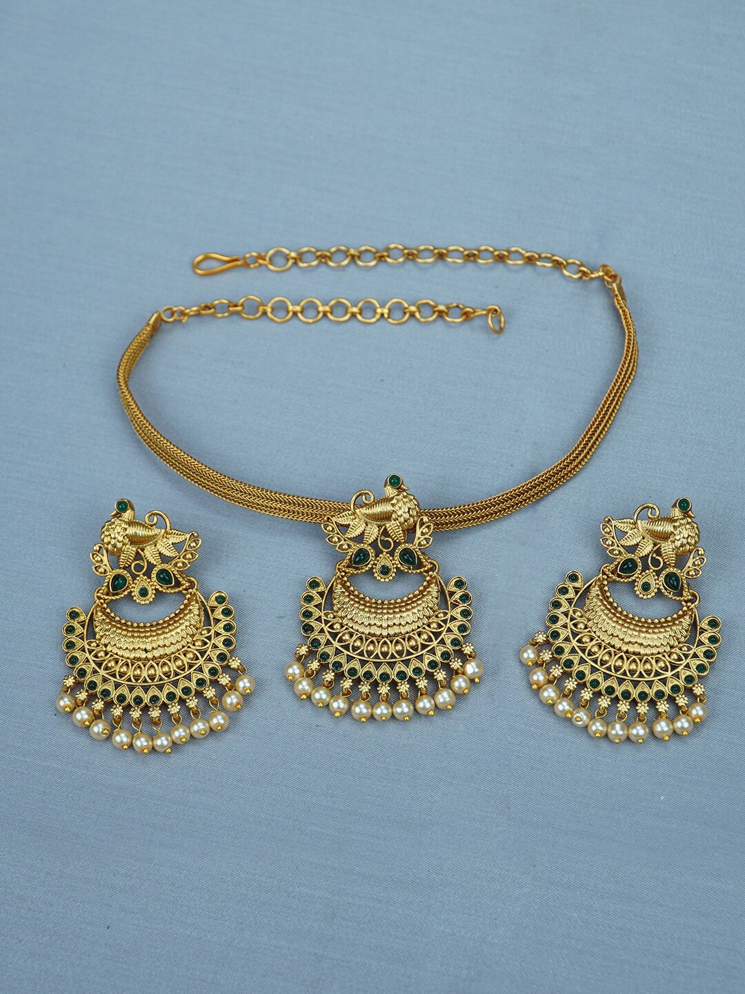 

Diksha collection Gold-Plated Stone Studded Jewellery Set
