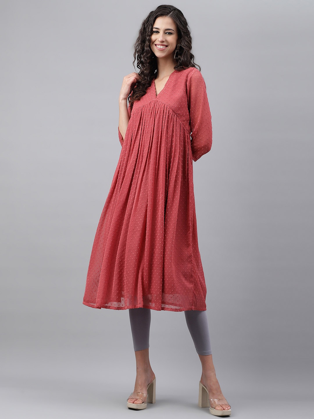 

Janasya Dobby Self Design Empire Chiffon Kurta, Rust