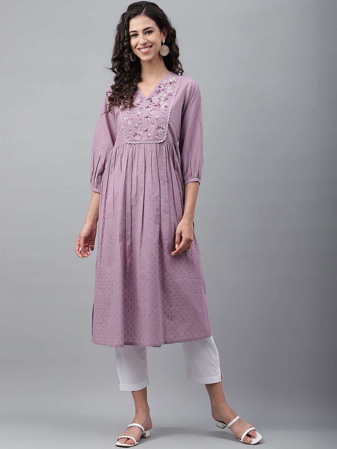 

Janasya Women Floral Embroidered A-Line Cotton Kurta, Lavender