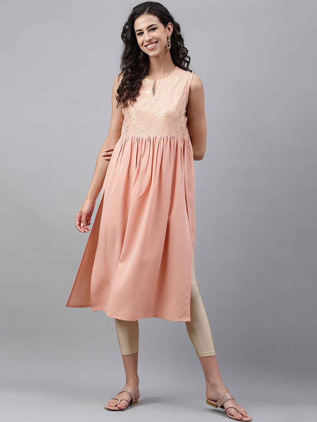 

Janasya Peach-Coloured & Gold-Toned Floral Printed Gotta Patti A-Line Crepe Kurta