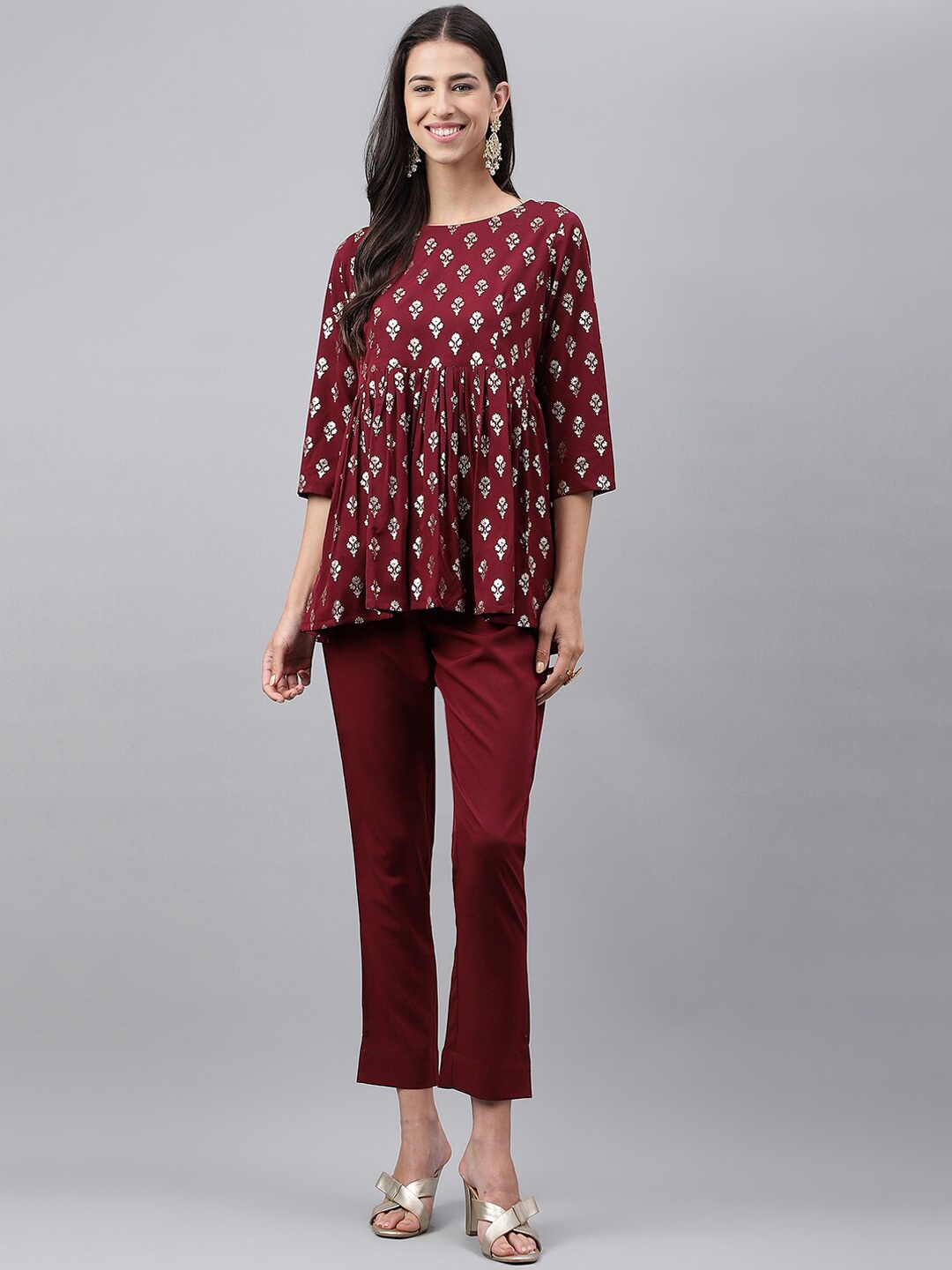 

Janasya Maroon Floral Foil Printed A-Line Ethnic Top with Trousers