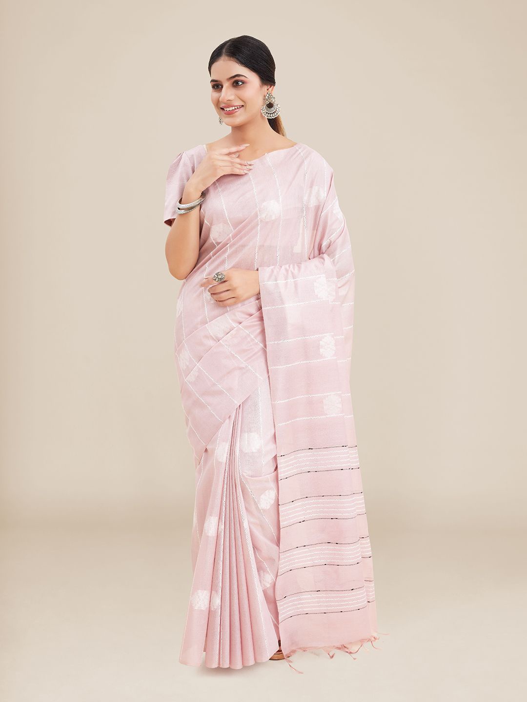 

Kalyan Silks Pink Ethnic Motifs Art Silk Tussar Saree
