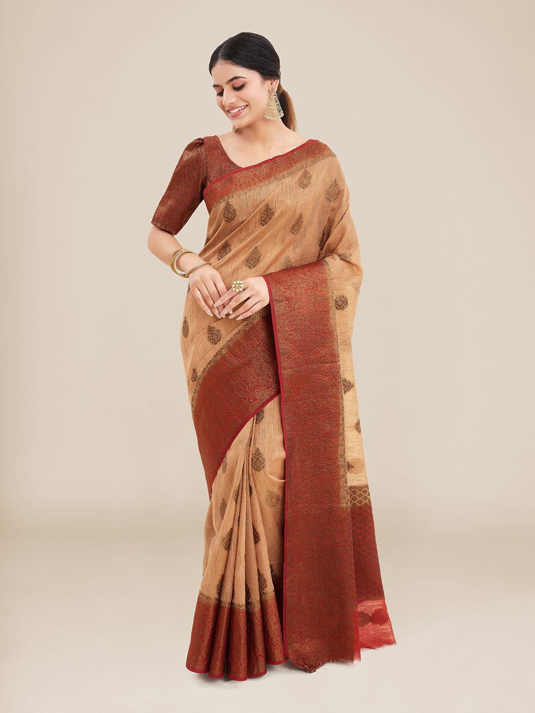 

Kalyan Silks Beige & Red Woven Design Zari Banarasi Saree