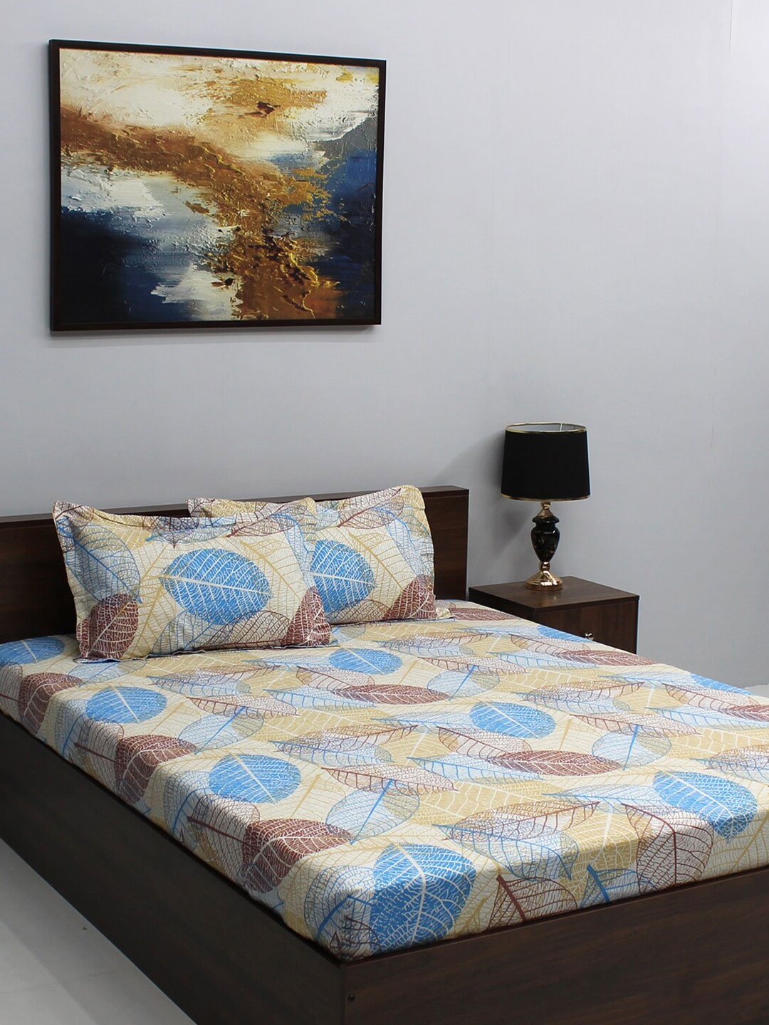 

BOMBAY DYEING Yellow & Blue Typography 104 TC Queen Bedsheet with 2 Pillow Covers