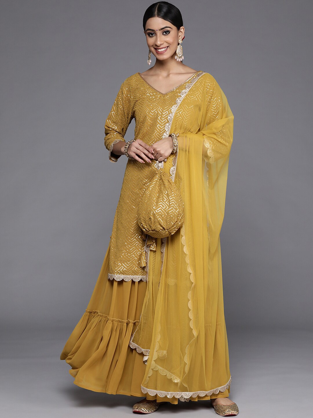 

Libas Mustard Yellow Embroidered Sequinned V-Neck Kurta with Sharara & Dupatta
