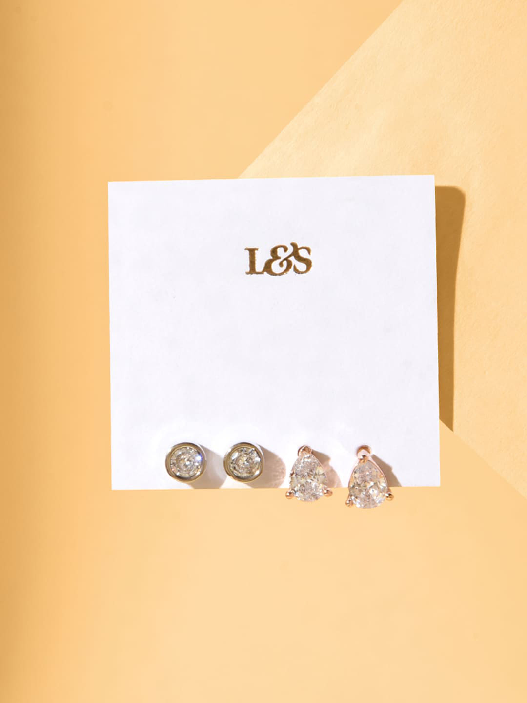 

Lilly & sparkle Set Of 2 Rose Gold-Plated Cubic Zirconia Studded Studs Earrings