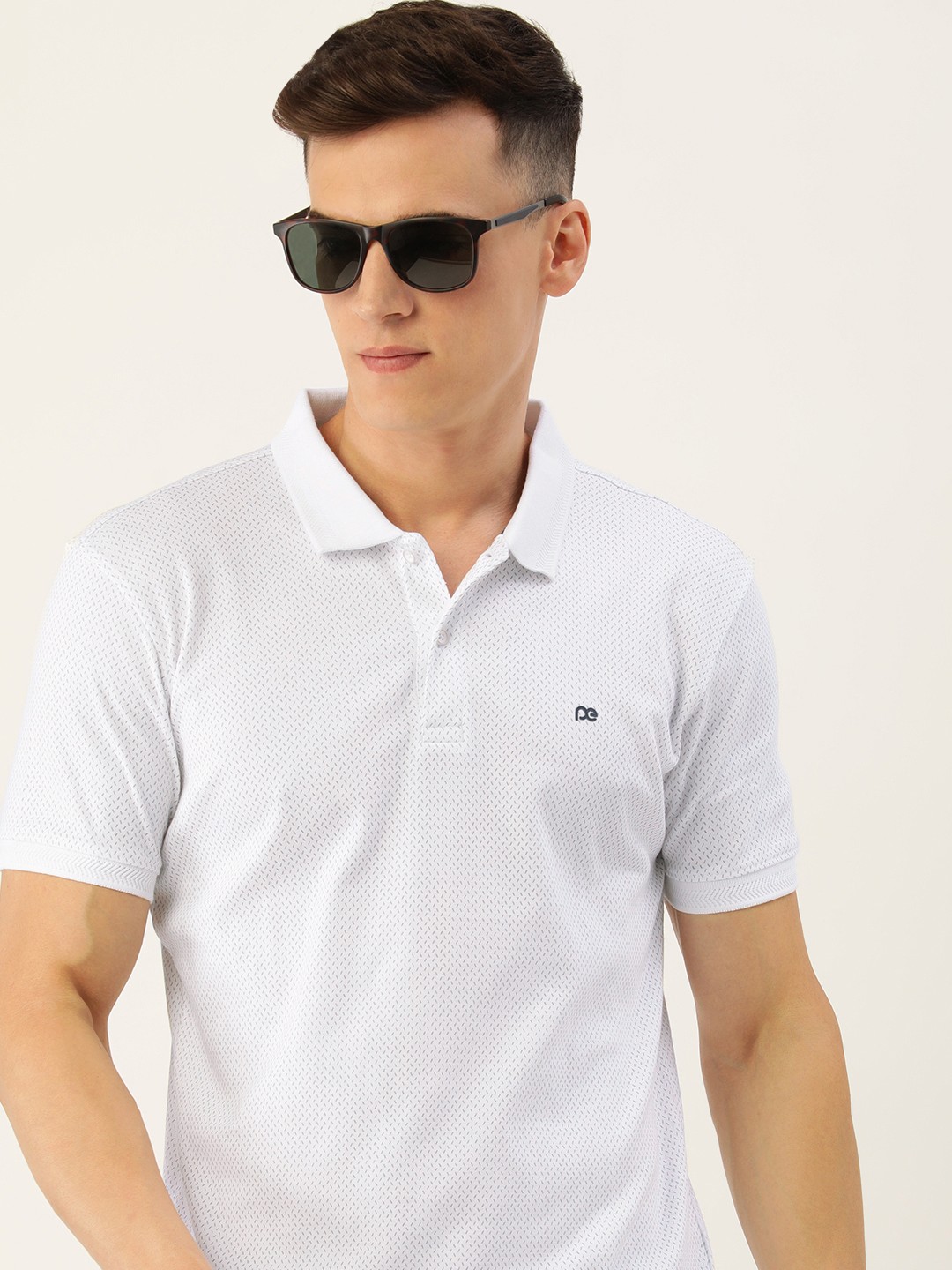

Peter England Men Printed Polo Collar Slim Fit Cotton T-shirt, White