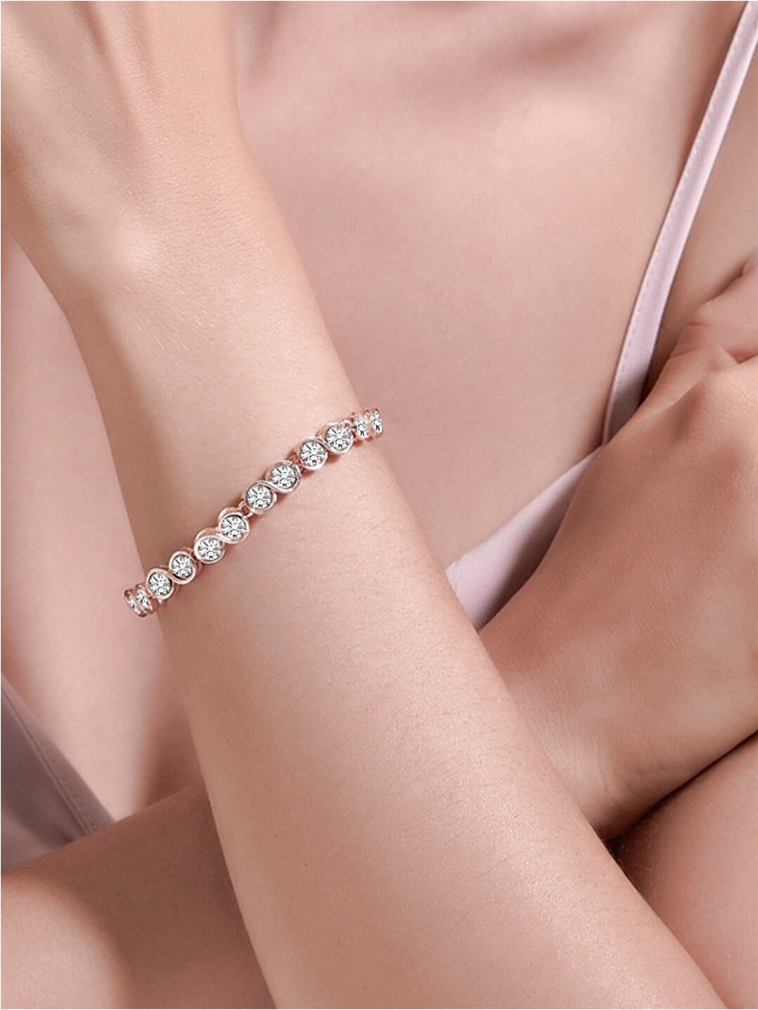 

Peora Rose Gold-Plated American Diamond Studded Charm Bracelet