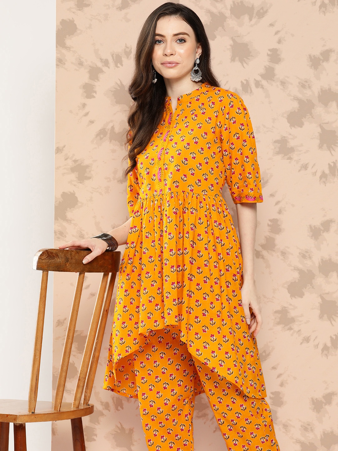

KALINI Floral Printed Regular Pure Cotton Kurta with Trousers, Mustard