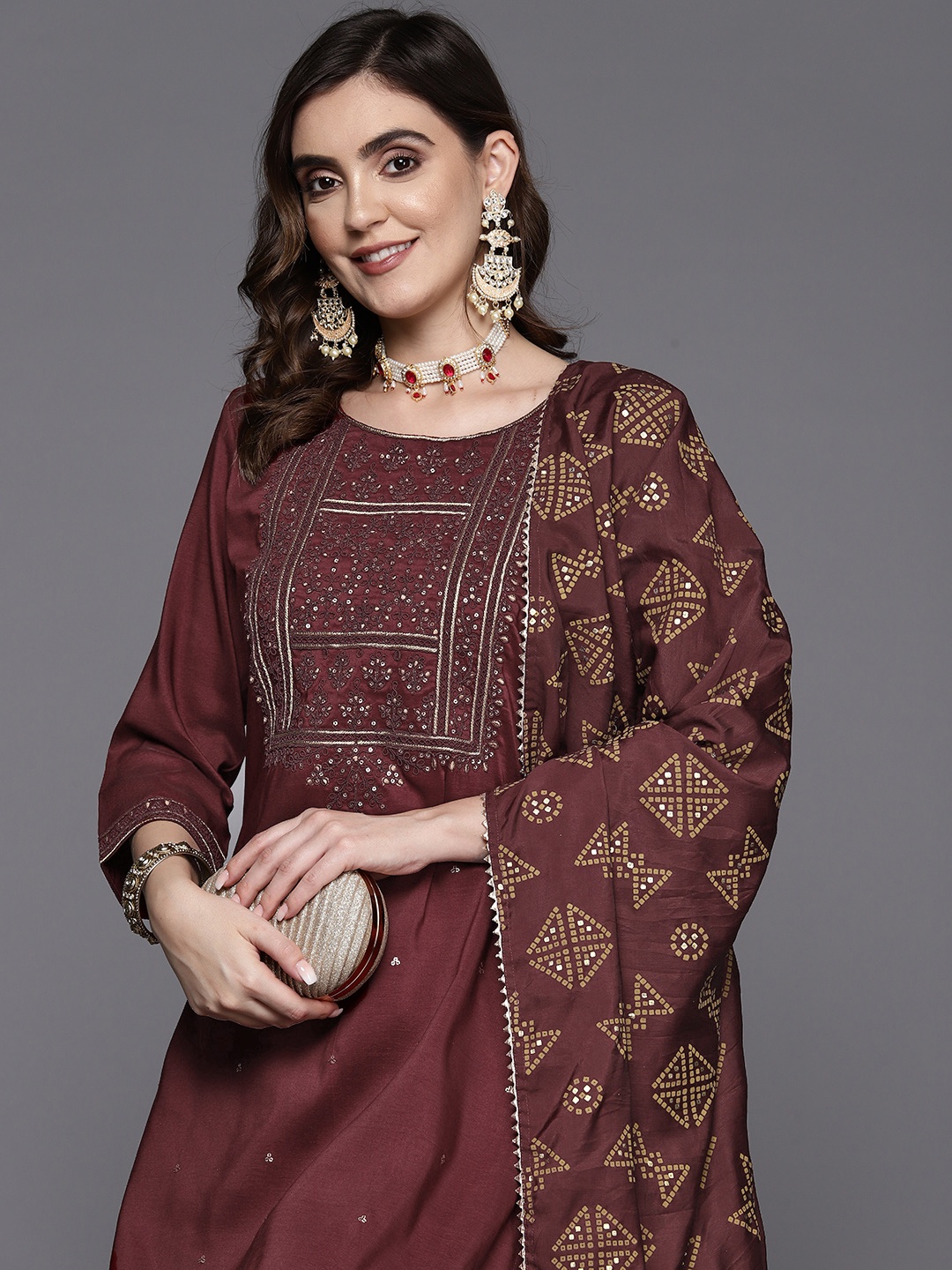 

Indo Era Women Floral Yoke Design Regular Sequinned Kurta with Trousers & With Dupatta, Maroon