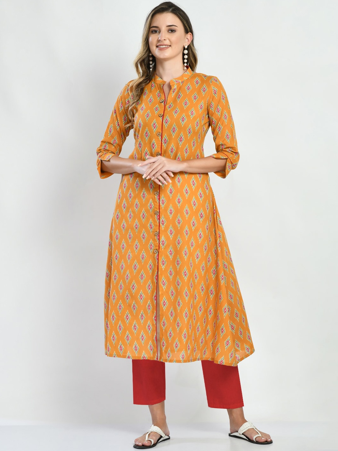 

Akshatani Ethnic Motifs Printed A-Line Pure Cotton Kurta, Mustard