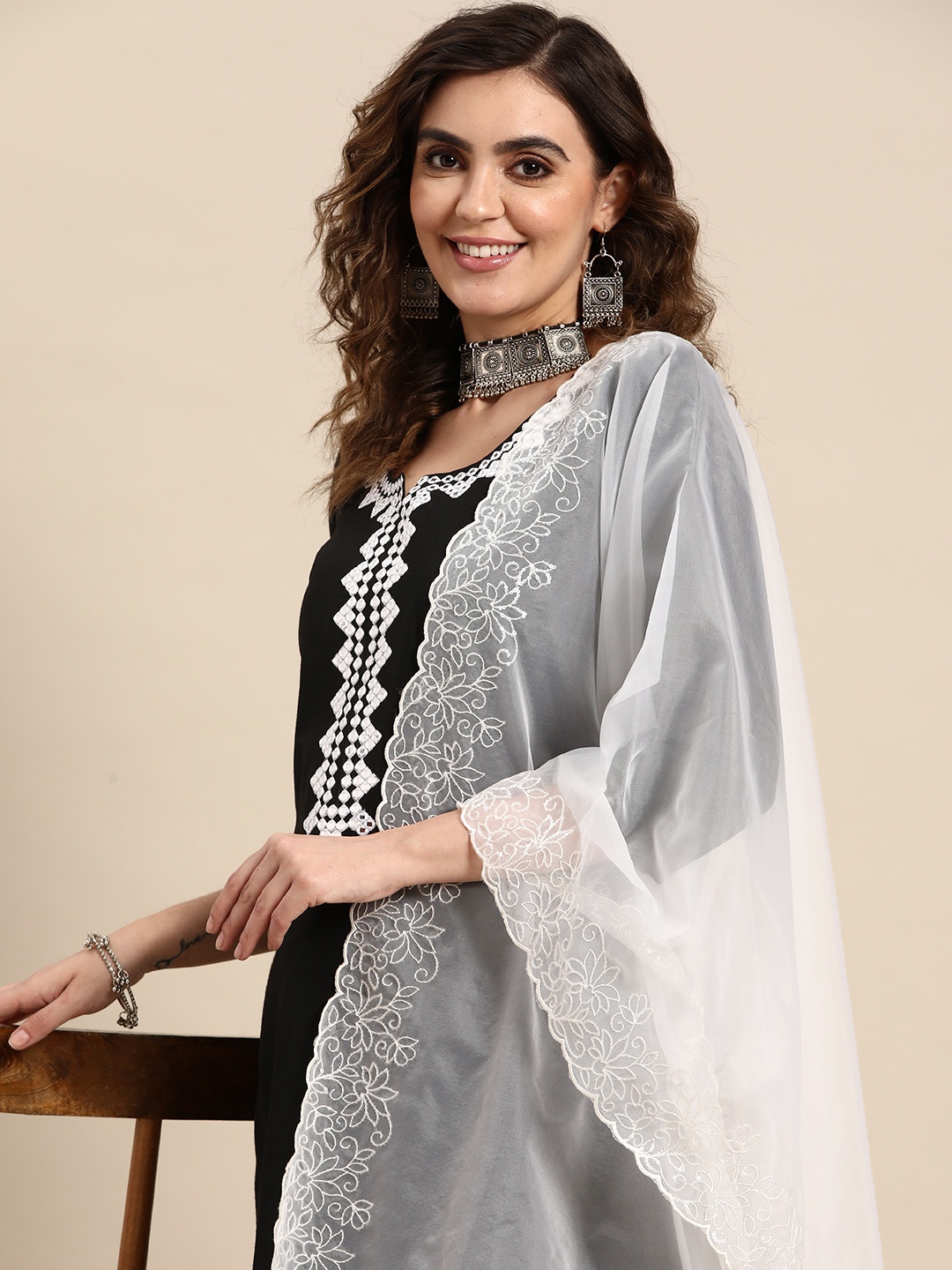 

Sangria Women Black Floral Embroidered Regular Thread Work Kurta with Trousers & With Dupatta