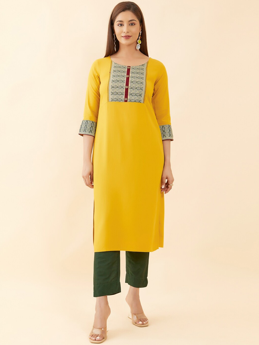 

Maybell Ethnic Motif Yoke Design Thread Work Kurta, Yellow