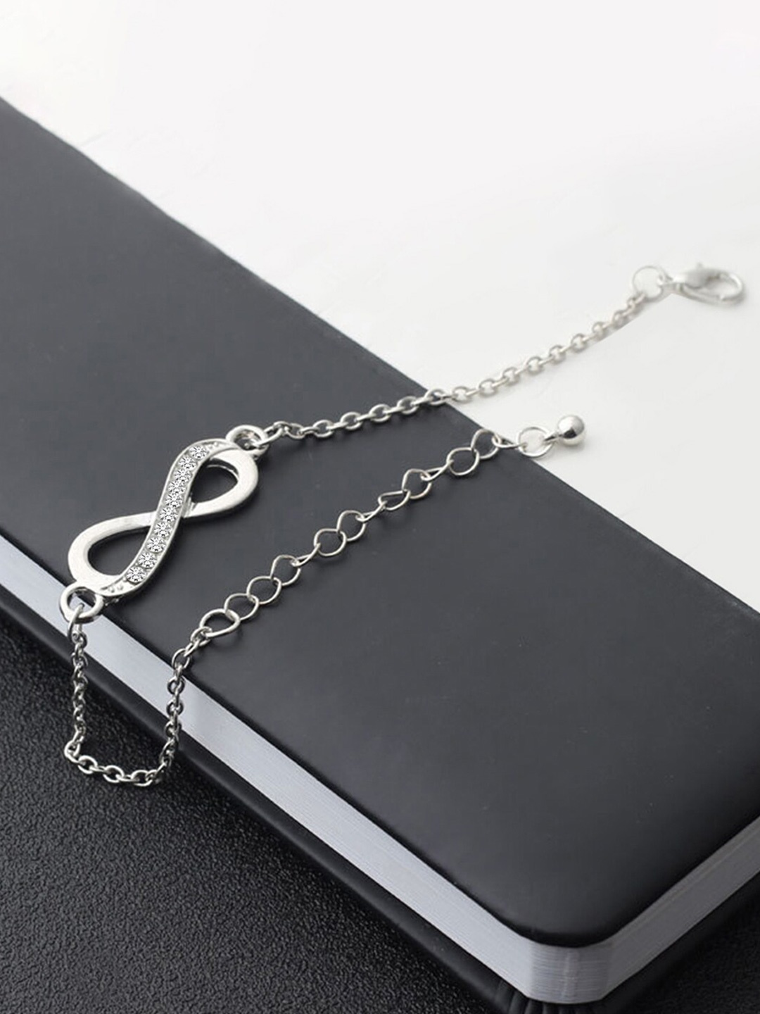 

Peora Silver-Plated American Diamond Studded Charm Bracelet
