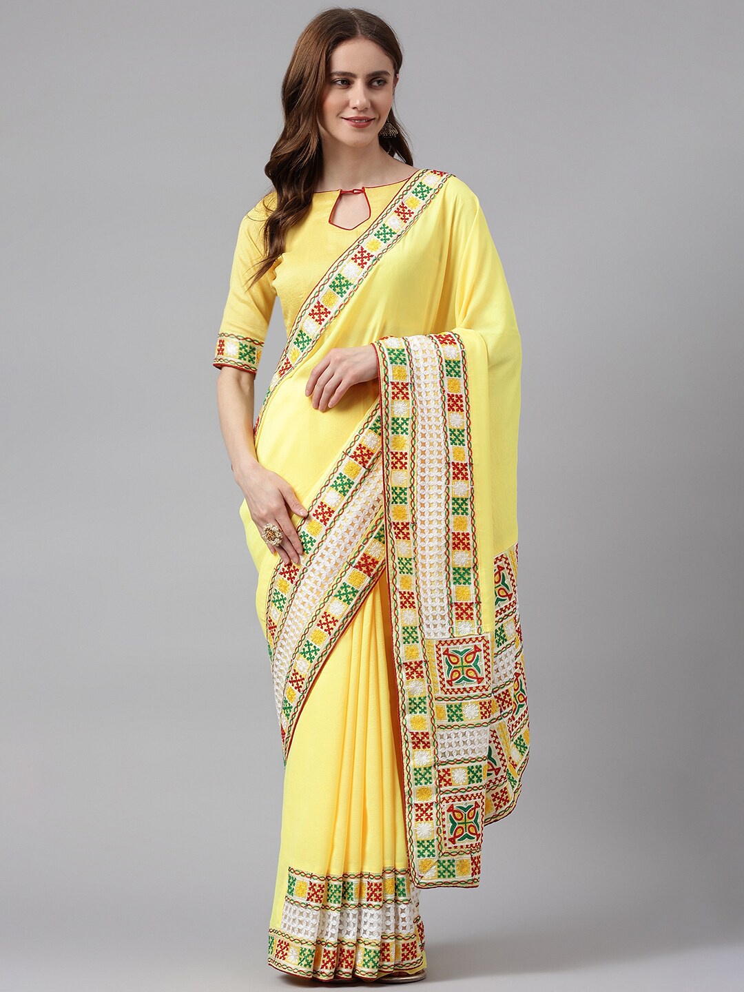 

RAJGRANTH Yellow & White Kutchi Embroidered Pure Linen Bagh Saree
