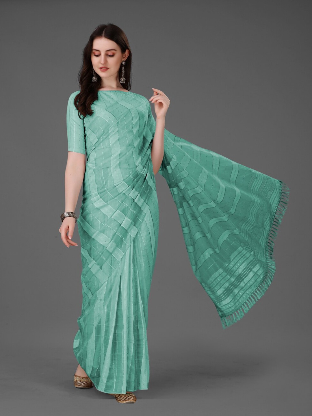 

Anouk Sea Green & Silver-Toned Striped Zari Silk Cotton Saree