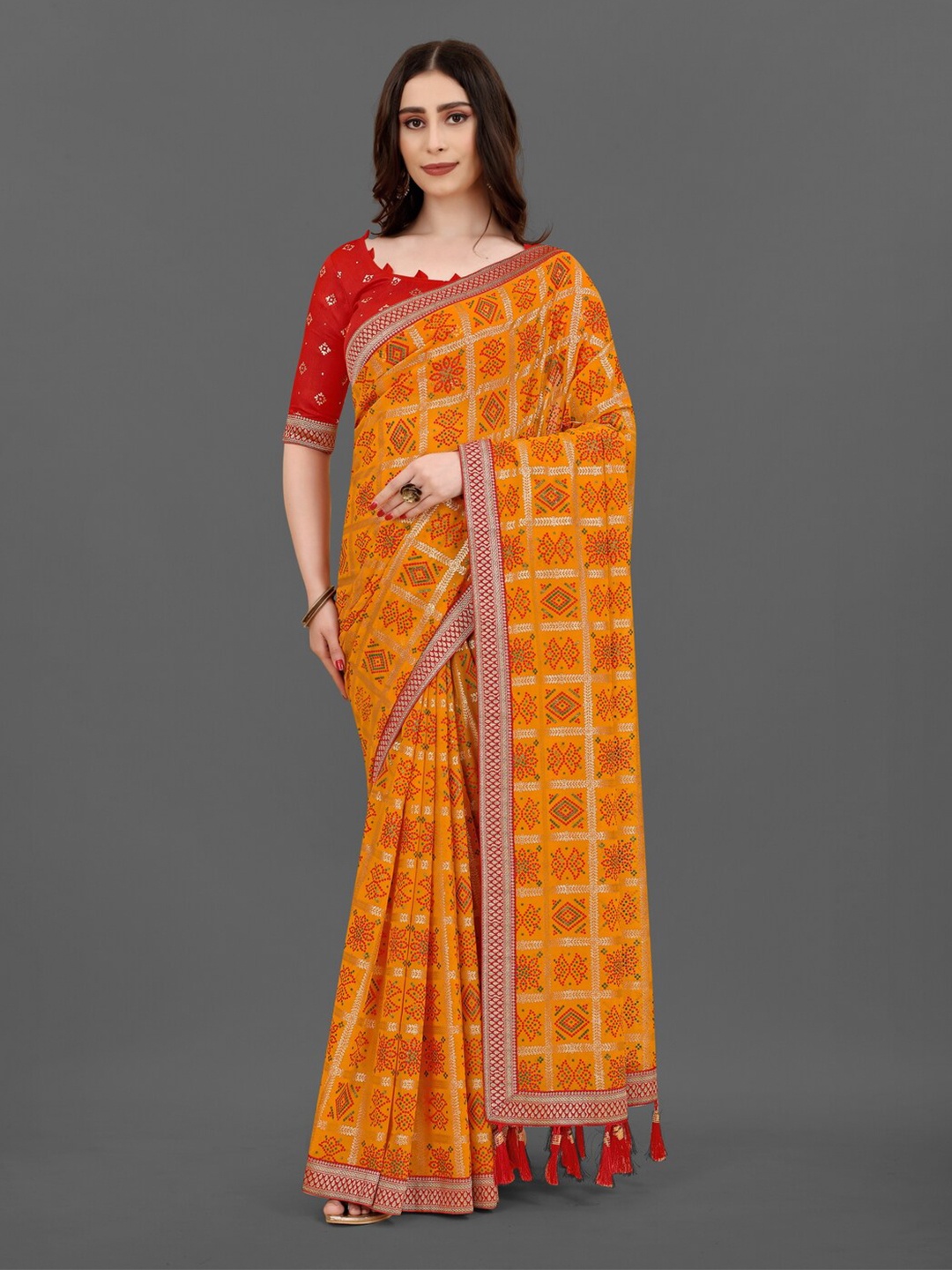 

Anouk Orange & Red Bandhani Printed Zari Pure Georgette Saree