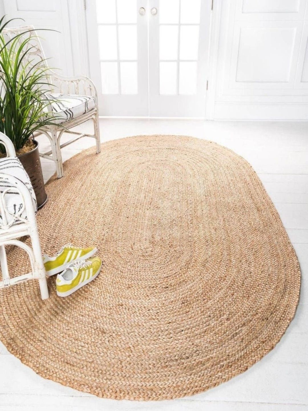 

THE HANDMADE FLAIR Beige Braided Jute Oval Shaped Carpet