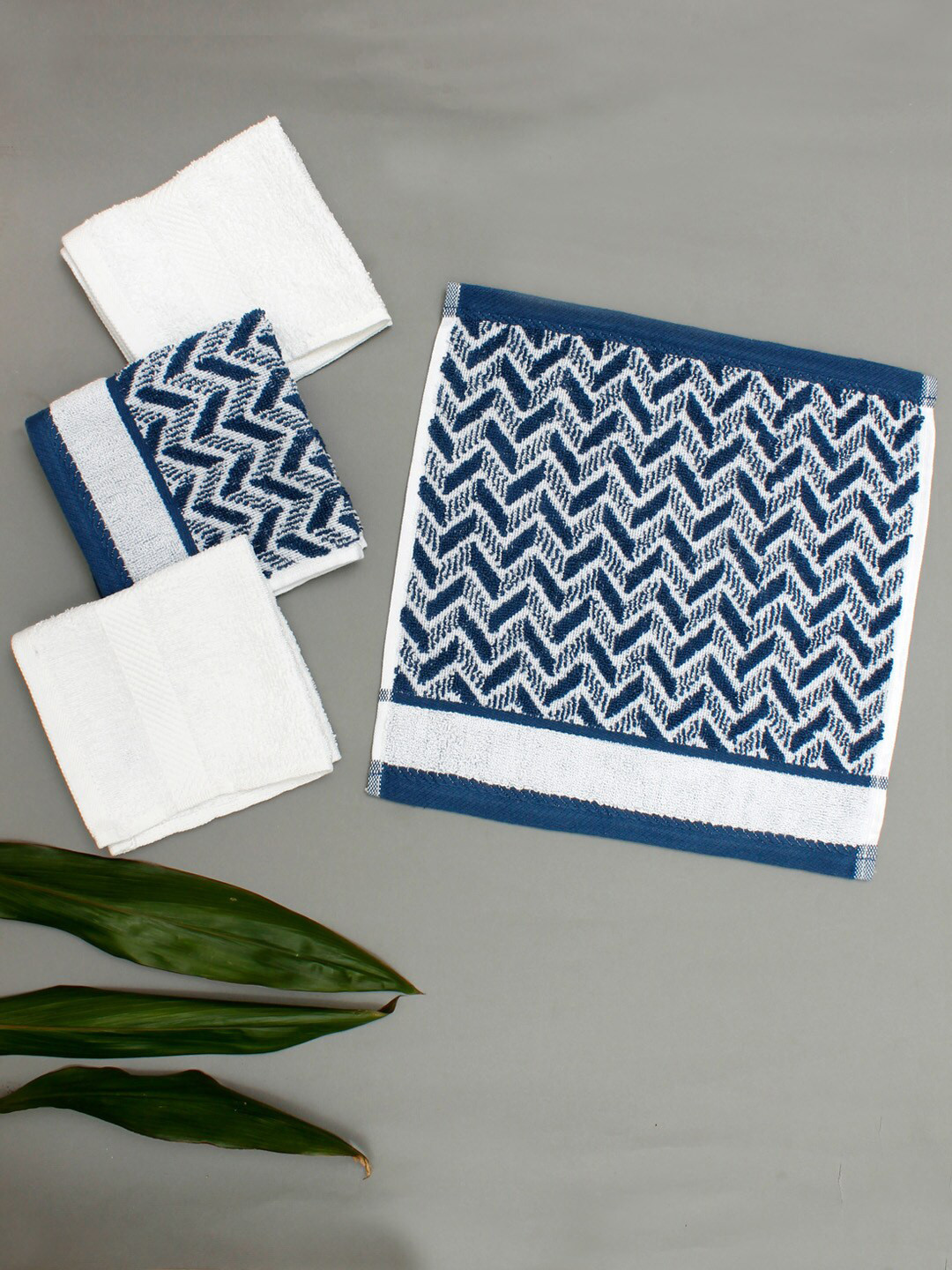 

AVI Living Blue & White 4 Pcs Self Design 500 GSM Highly Absorbent Pure Cotton Face Towels